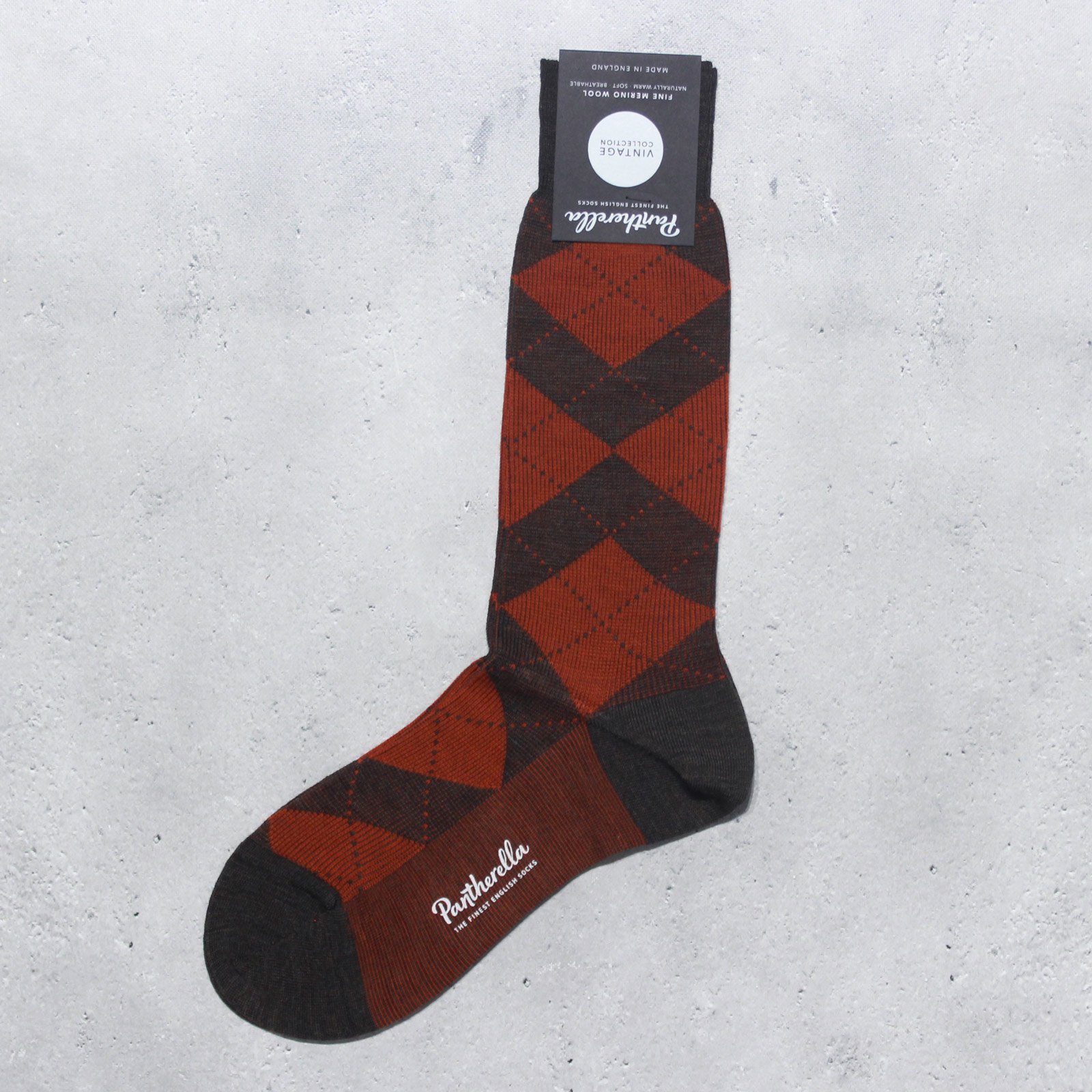 <img class='new_mark_img1' src='https://img.shop-pro.jp/img/new/icons8.gif' style='border:none;display:inline;margin:0px;padding:0px;width:auto;' />PantherellaArgyle Wool Socks 593082(Dark Brown Mix)