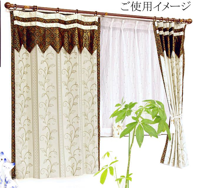 バランス付きフラットスタイルかわいいエスニック 寝室 カーテン 遮光2級グリーン色リーフ柄カイサーのご使用イメージ