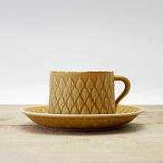 Relief Tea Cup And Saucer