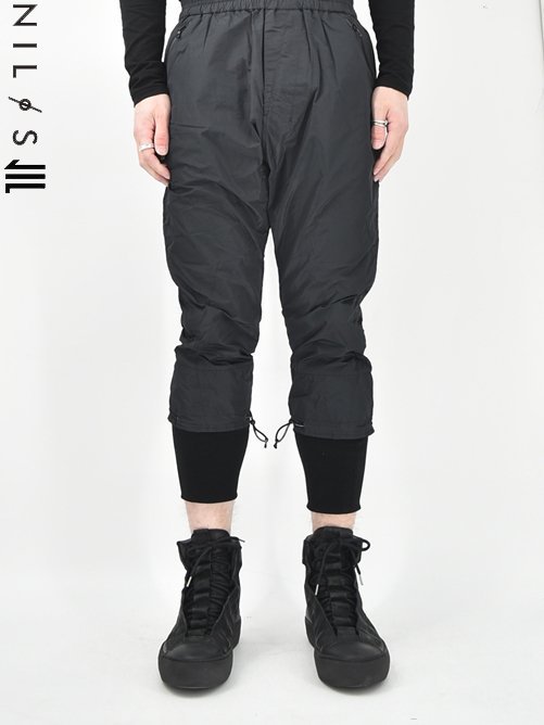 NILøS[ニルズ] Spindle Rayered Hem Track Pants スピンドルレイヤードヘムトラックパンツ