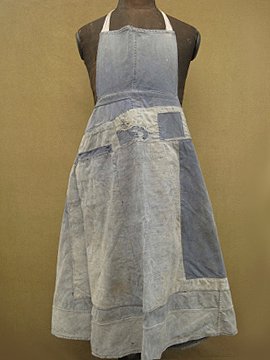 cir. 1930 - 1950's patched blue apron