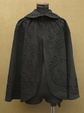early 20th c. black braiding wool cape