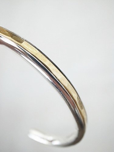 Slow Rise silver roll bangle unisex