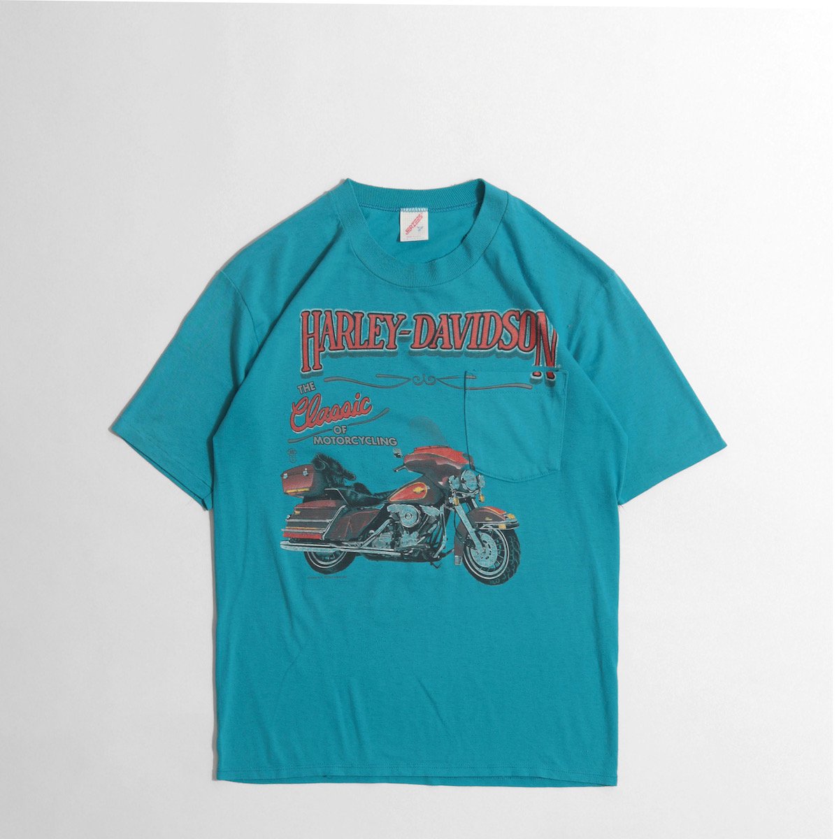 レディース] 1990s USA製 オーバーサイズ ハーレーダビッドソン プリントTシャツ ポケT 両面 ターコイズブルー [HARLEY-DAVIDSON]  8140-2