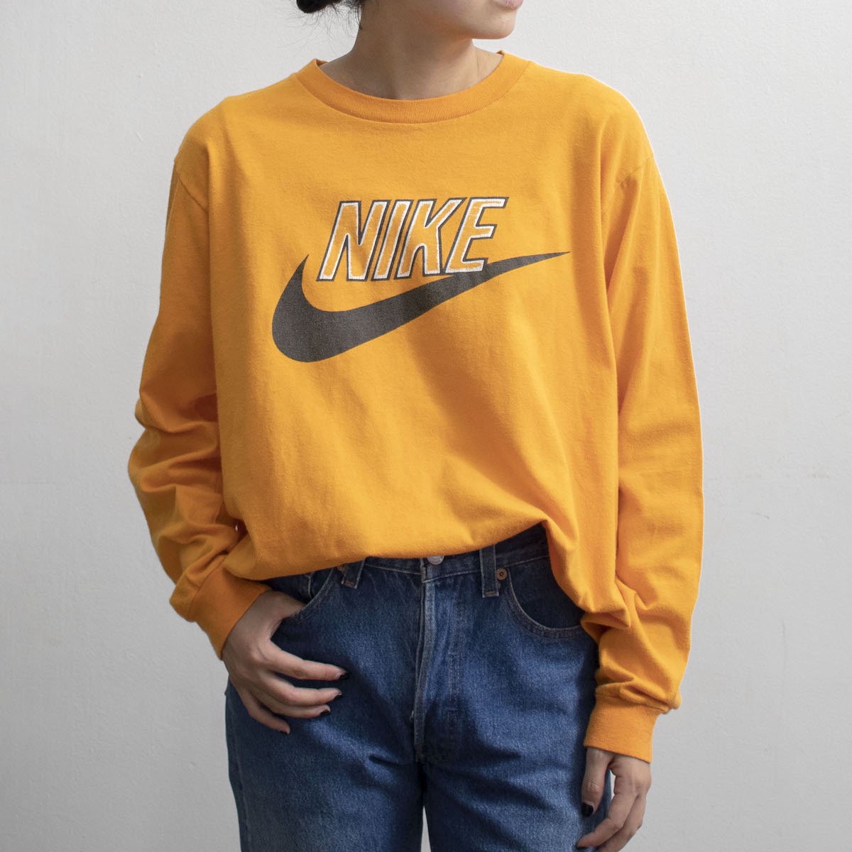 [レディース] 1980s ヴィンテージ 紺タグ ナイキ ビッグサイズ ロゴプリント ロングTシャツ オレンジ [NIKE]