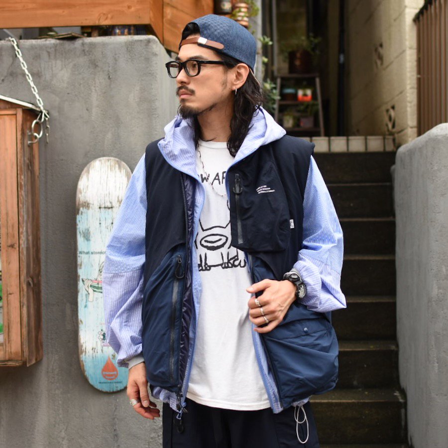 コムフィアウトドアガーメント ( COMFY OUTDOOR GARMENT ) CMF OVERLAY DOWN VEST / シーエムエフ オーバーレイ  ベスト NAVY メンズ レディース - エンシニータス